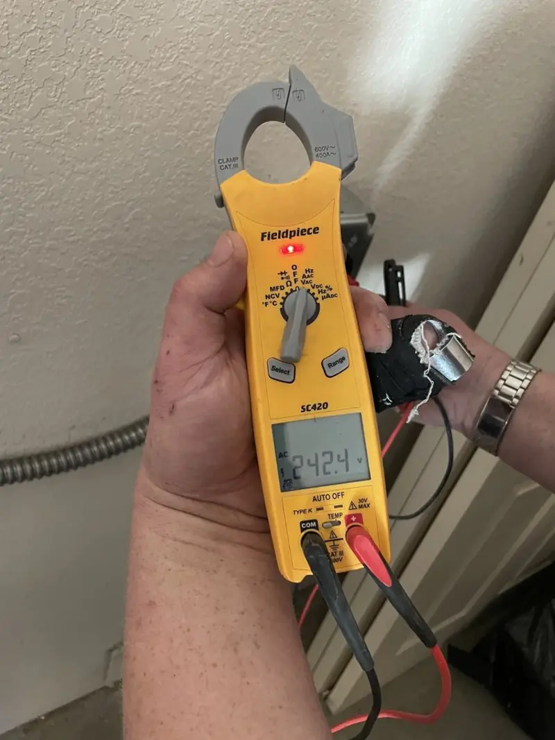 Voltage testing with clamp meter during Outlet Installation in Lackawaxen